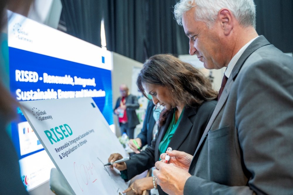 Signing at the RISED stand
