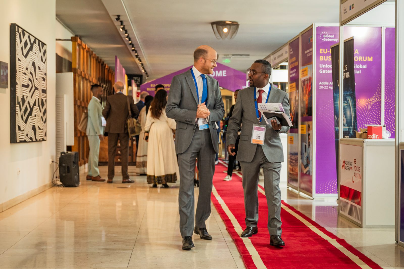 Delegates arriving along the branded corridor