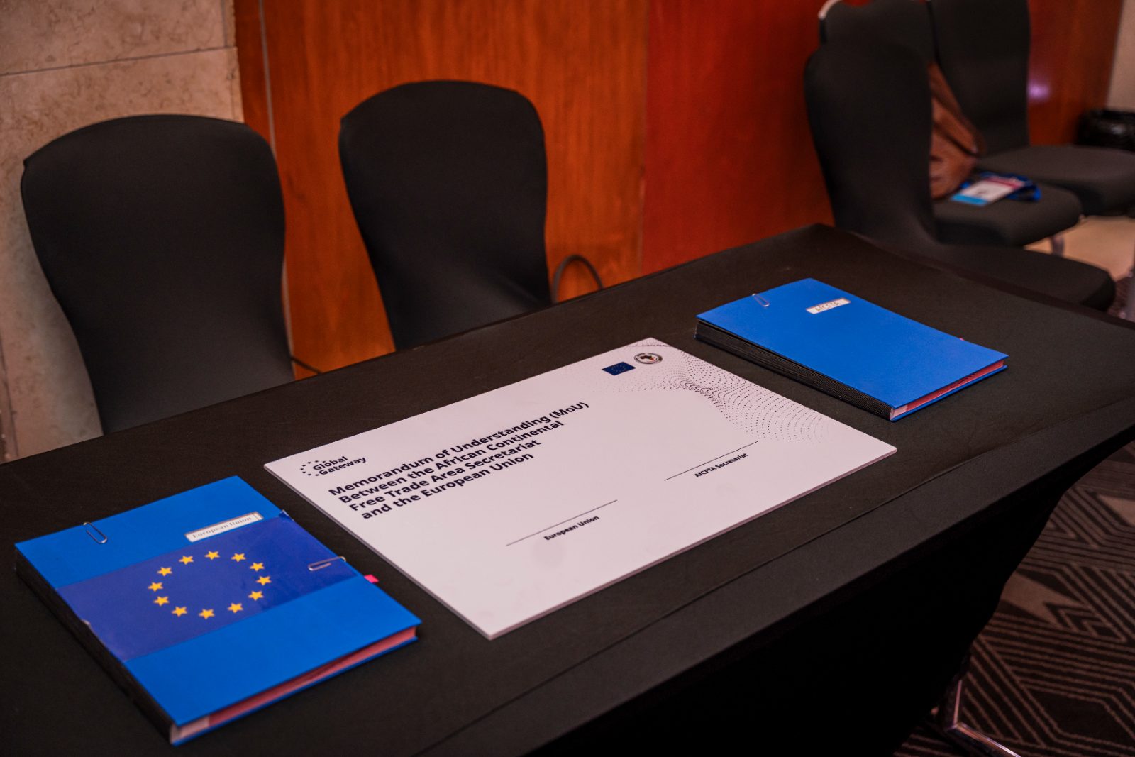 Signature folders laid out before the ceremony