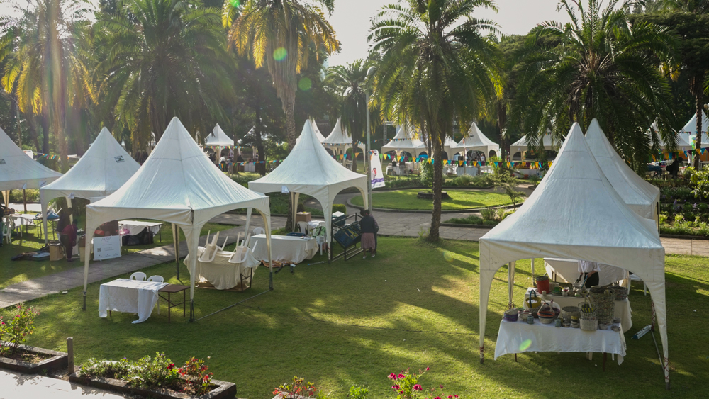 Shir Shir Bazaar — vendor stands set up on the lawn in the morning light