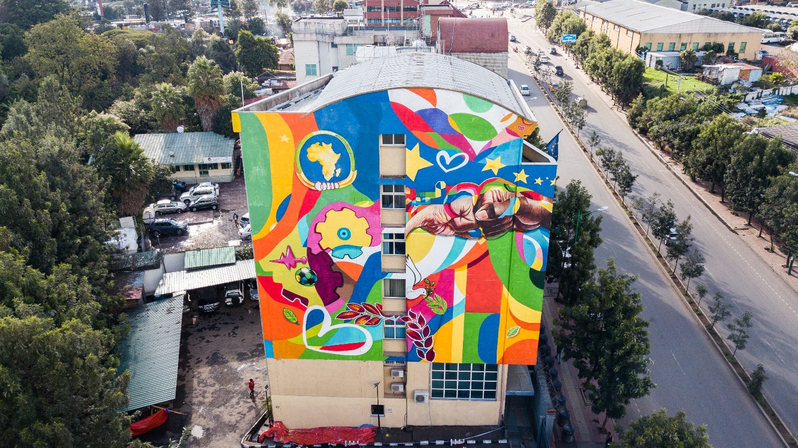 Street Heart — the painted building seen from the air, in its street